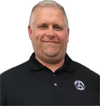 portrait of Douglas Durand wearing a Sullivan & McLaughlin Companies shirt