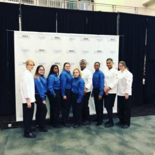 group photo of students at the Massachusetts ProStart Invitational Event at Gillette Stadium 