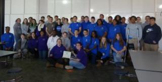 group photo of students receiving citation from Lt. Governor Karyn Polito for participating in STEM Week