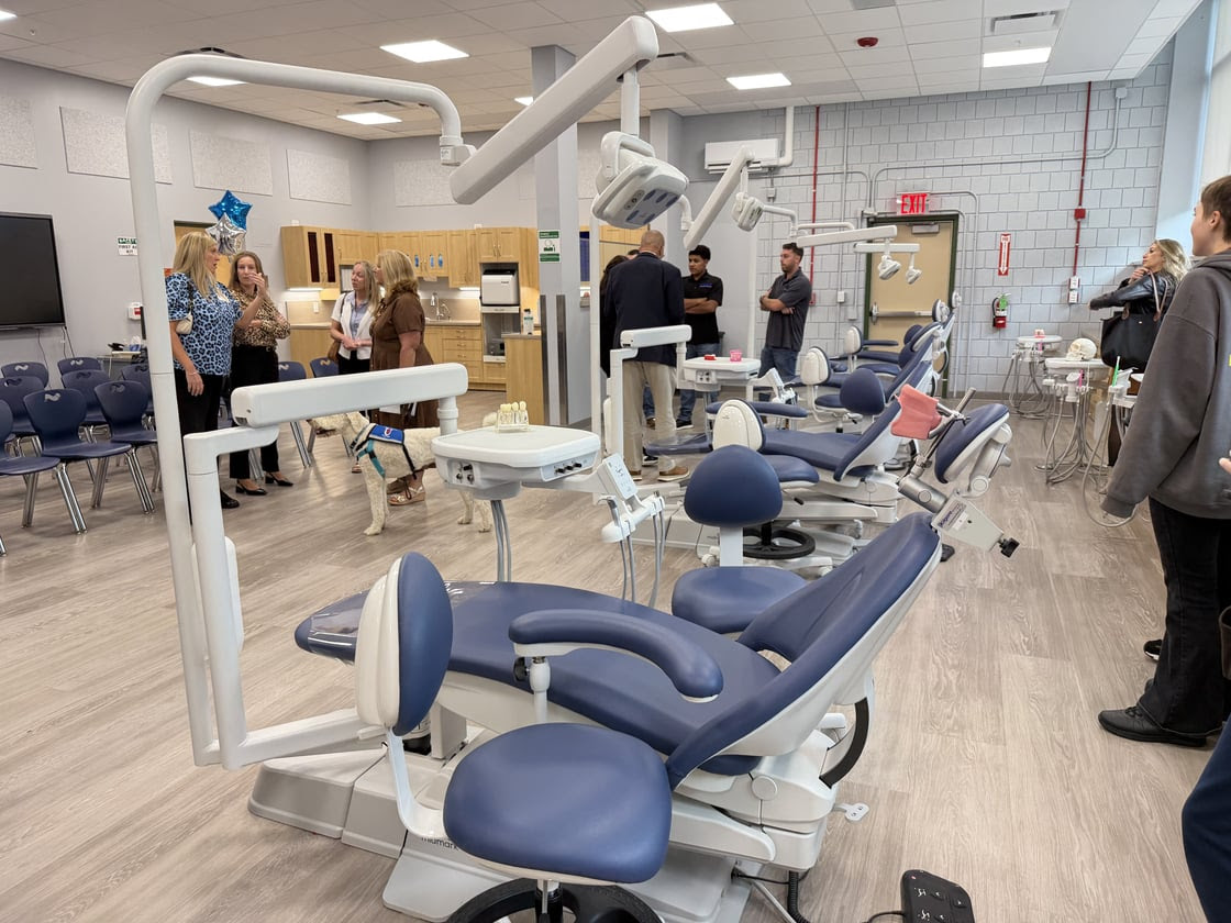 Photo view of multiple dental chairs and tools